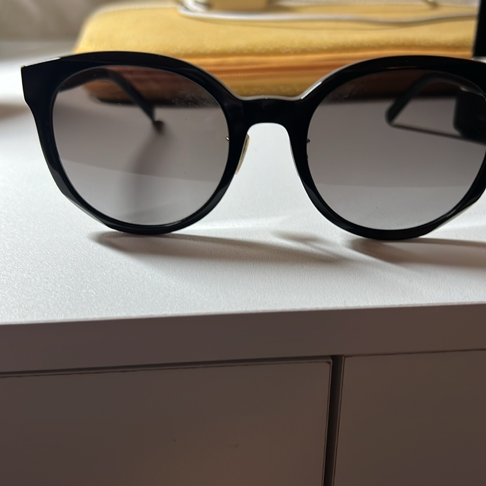 Givenchy GV40017F black round acetate sunglasses.